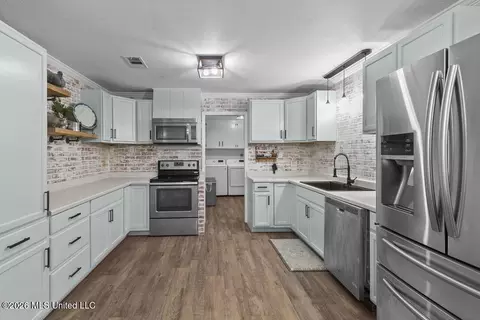 Kitchen - 303 Cox Ferry Rd, Flora, MS 39071 photo 2 of 5