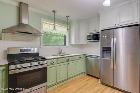 Kitchen - 9124 Wire Rd, Vancleave, MS 39565 photo 2 of 2
