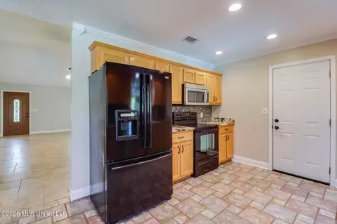 Kitchen - 19457 Saucier Lizana Rd, Saucier, MS 39574 photo 2 of 3