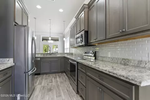 Kitchen - 87112 Highpoint Dr, Diamondhead, MS 39525 photo 2 of 2