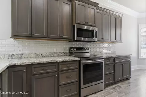 Kitchen - 87112 Highpoint Dr, Diamondhead, MS 39525 photo 1 of 2