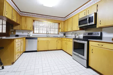 Kitchen - 201 Sinclair St, Mccomb, MS 39648 photo 1 of 6