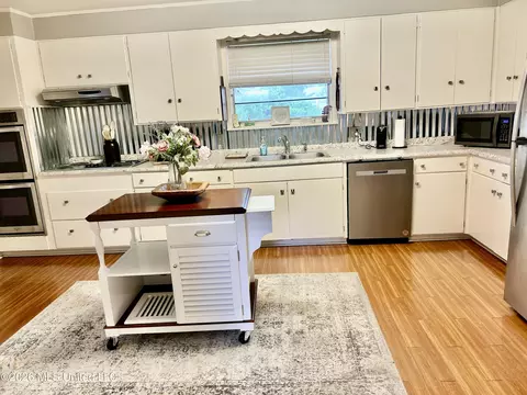 Kitchen - 228 Sinclair St, Mccomb, MS 39648 photo 1 of 6
