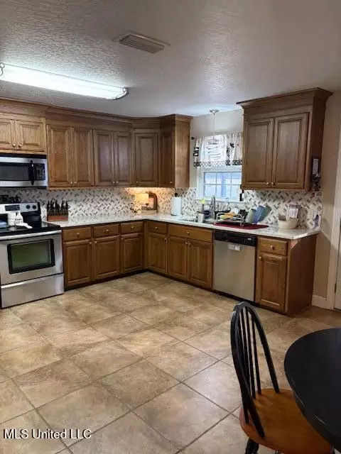 Kitchen - 147 Howells Ferry Rd, Lucedale, MS 39452 photo 2 of 2