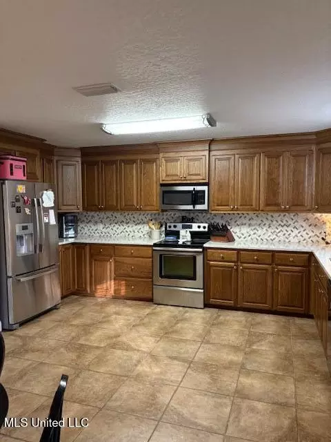 Kitchen - 147 Howells Ferry Rd, Lucedale, MS 39452 photo 1 of 2