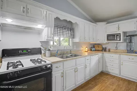 Kitchen - 340 E Bond Rd, Wiggins, MS 39577 photo 2 of 2