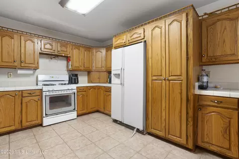 Kitchen - 4875 Plantation Rd, Saucier, MS 39574 photo 3 of 4