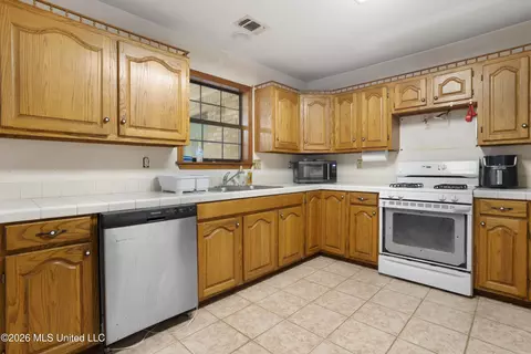 Kitchen - 4875 Plantation Rd, Saucier, MS 39574 photo 2 of 4