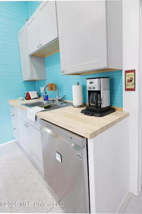Kitchen - 723 Delaware Ave, Mccomb, MS 39648 photo 5 of 5