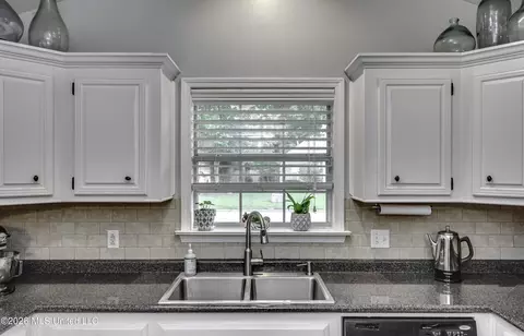 Kitchen - 690 Olympic Dr, Flowood, MS 39232 photo 7 of 7