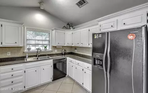 Kitchen - 690 Olympic Dr, Flowood, MS 39232 photo 3 of 7