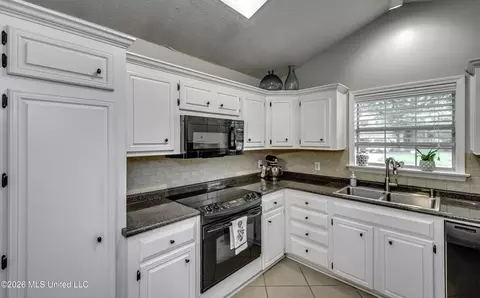 Kitchen - 690 Olympic Dr, Flowood, MS 39232 photo 2 of 7
