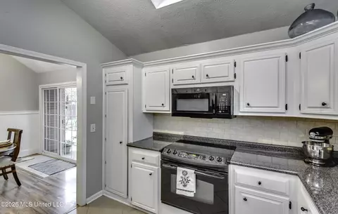 Kitchen - 690 Olympic Dr, Flowood, MS 39232 photo 6 of 7
