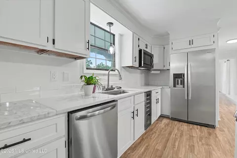 Kitchen - 11929 Patrick Henry St, Moss Point, MS 39562 photo 2 of 3