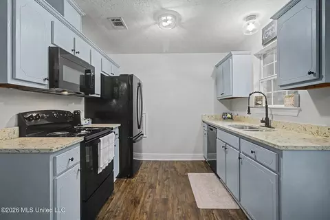 Kitchen - 105 Hall St, Wiggins, MS 39577 photo 2 of 2
