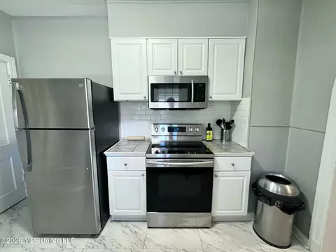 Kitchen - 512 E Franklin St, Carthage, MS 39051 photo 3 of 4