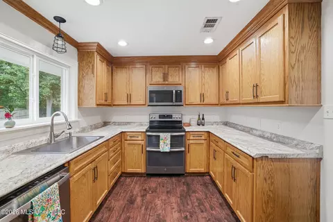 Kitchen - 965 E Second St, Pass Christian, MS 39571 photo 2 of 4