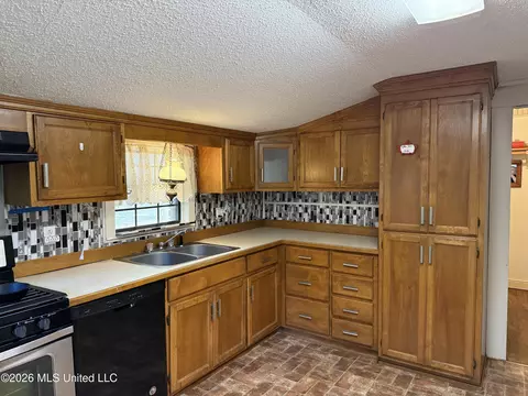 Kitchen - 131 N Fourth St, Wiggins, MS 39577 photo 2 of 2