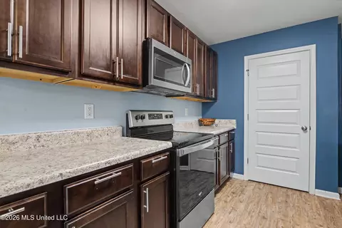 Kitchen - 405 E Petunia Dr, Long Beach, MS 39560 photo 4 of 5