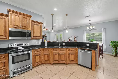 Kitchen - 25034 Yellow Bluff Rd, Lucedale, MS 39452 photo 2 of 3