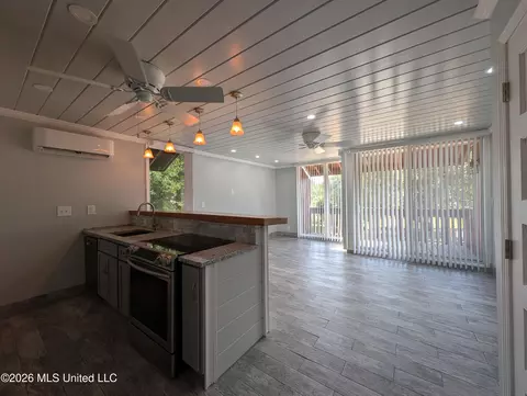 Living - 232 Lakeside Villla, Diamondhead, MS 39525 photo 2 of 3