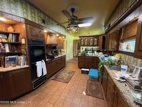 Kitchen - 300 East Ave, Lula, MS 38644 photo 2 of 3