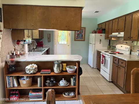 Kitchen - 20116 F Ladner Rd, Saucier, MS 39574 photo 2 of 2