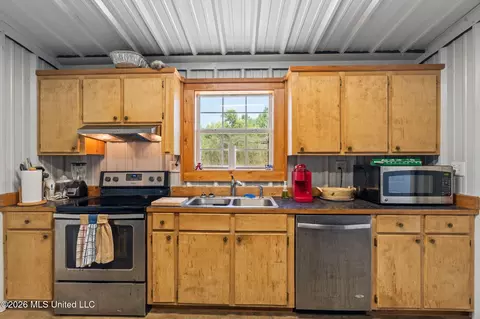 Kitchen - 167 Military Rd, Sandy Hook, MS 39478 photo 3 of 3