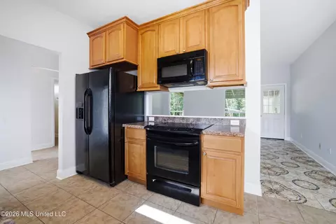 Kitchen - 21549 W Edgewood Dr, Saucier, MS 39574 photo 3 of 3