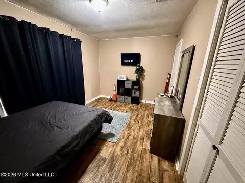 Bedroom - 453 NW Oak St, Magee, MS 39111 photo 8 of 11