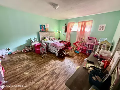 Bedroom - 453 NW Oak St, Magee, MS 39111 photo 10 of 11