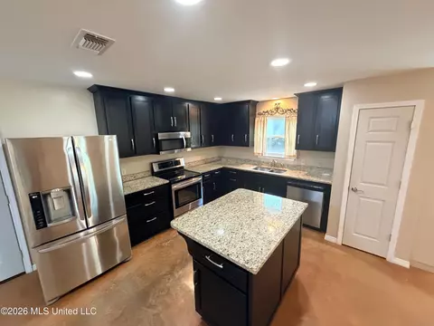 Kitchen - 293 W Fire Department Rd, Lucedale, MS 39452 photo 2 of 8