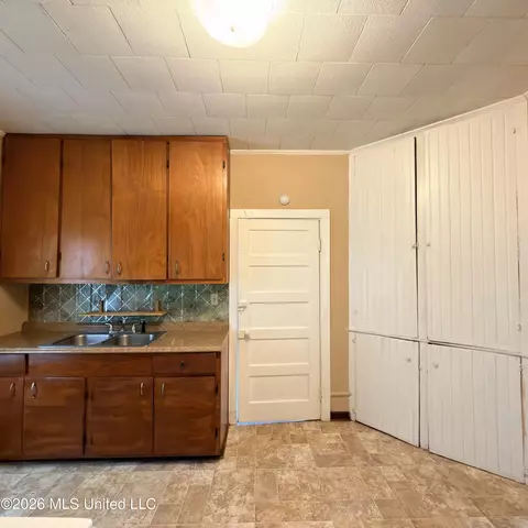 Kitchen - 406 S Washington St, Brookhaven, MS 39601 photo 3 of 4