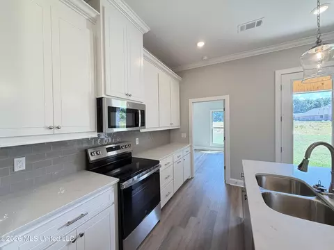 Kitchen - 140 Stapleton Dr, Canton, MS 39046 photo 2 of 2