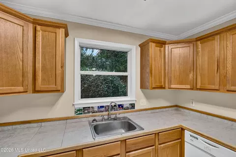 Kitchen - 958 Pono Pl, Diamondhead, MS 39525 photo 4 of 5