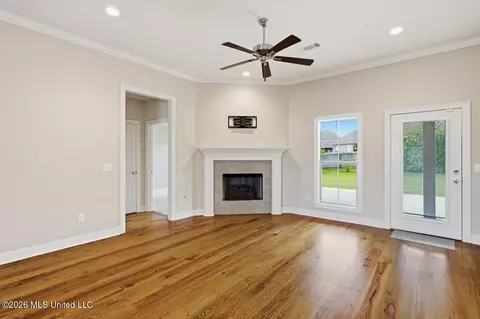 Living - 306 Woodscape Cv, Canton, MS 39046 photo 3 of 4
