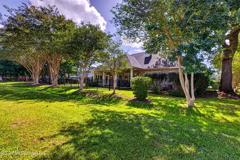 Exterior - 56135 E Diamondhead Dr, Diamondhead, MS 39525 photo 9 of 9