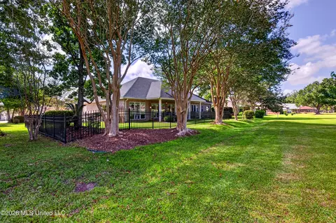 Exterior - 56135 E Diamondhead Dr, Diamondhead, MS 39525 photo 7 of 9