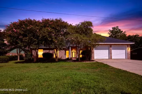 Exterior - 56135 E Diamondhead Dr, Diamondhead, MS 39525 photo 2 of 9