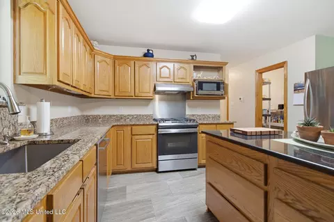 Kitchen - 18188 Howison Dr, Saucier, MS 39574 photo 3 of 5