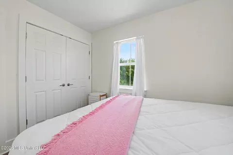 Bedroom - 215 E 2nd St #30, Pass Christian, MS 39571 photo 6 of 6