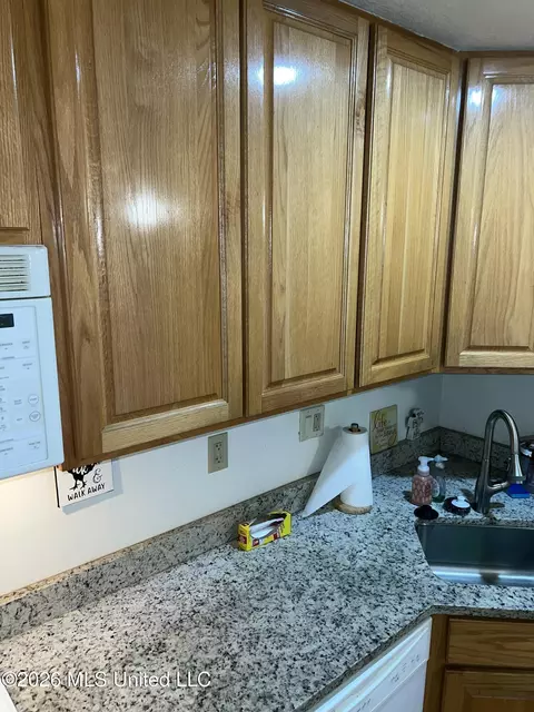 Kitchen - 109 Lakeside Villla, Diamondhead, MS 39525 photo 4 of 5