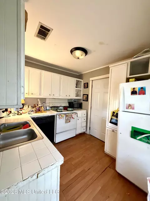 Kitchen - 809 Robertson St, Brookhaven, MS 39601 photo 2 of 2