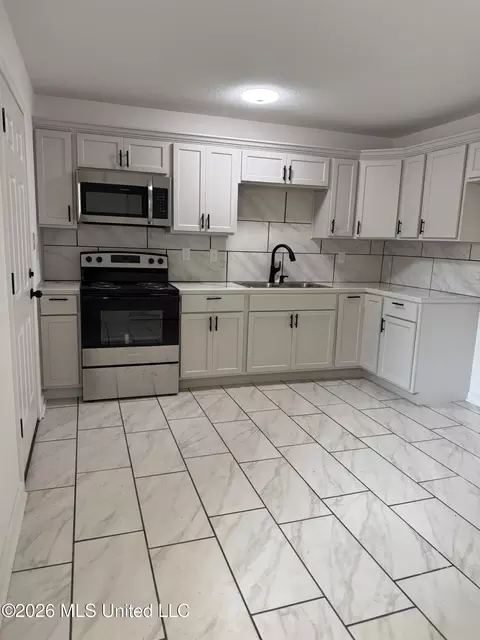 Kitchen - 905 8th St, Mccomb, MS 39648 photo 1 of 3