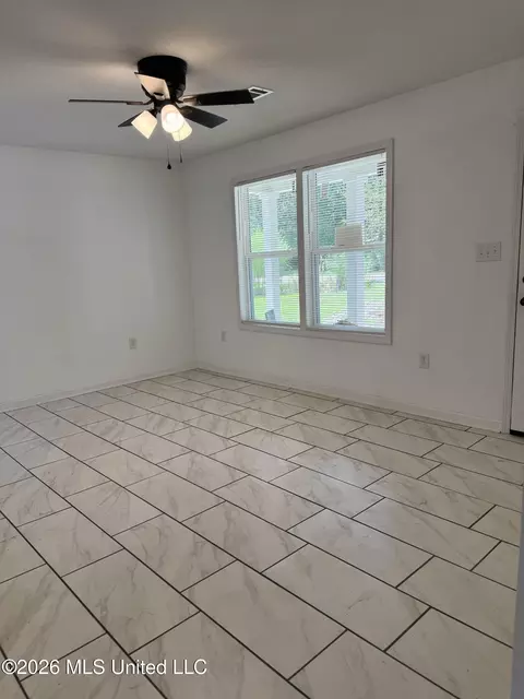 Living - 905 8th St, Mccomb, MS 39648 photo 2 of 2