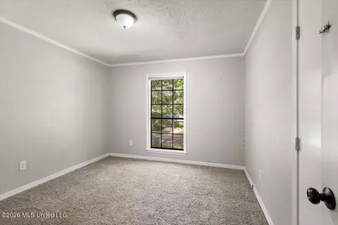 Bedroom - 703 Parker Dr, Clinton, MS 39056 photo 2 of 4