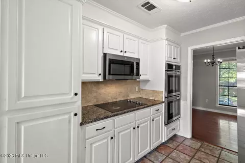 Kitchen - 703 Parker Dr, Clinton, MS 39056 photo 2 of 2