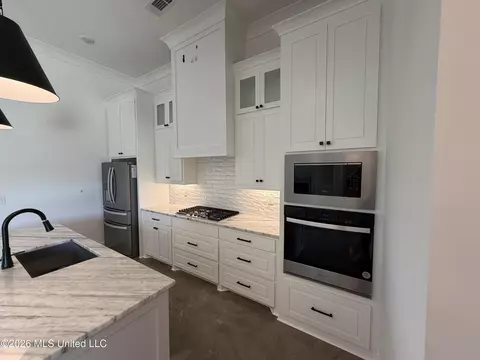 Kitchen - 303 Tremont Dr, Florence, MS 39073 photo 2 of 2