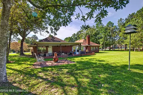Exterior - 56113 E Diamondhead Dr, Diamondhead, MS 39525 photo 11 of 15