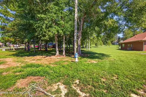 Exterior - 56113 E Diamondhead Dr, Diamondhead, MS 39525 photo 10 of 15